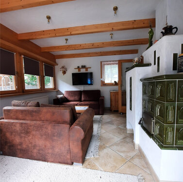 Wintergarten mit Kachelofen